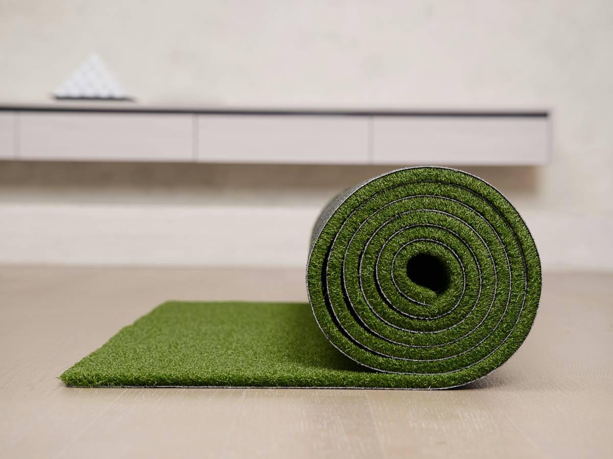 Side-by-side comparison: standard 18x30 inch doormat vs. oversized 30x48 inch indoor mat showing footstep coverage area