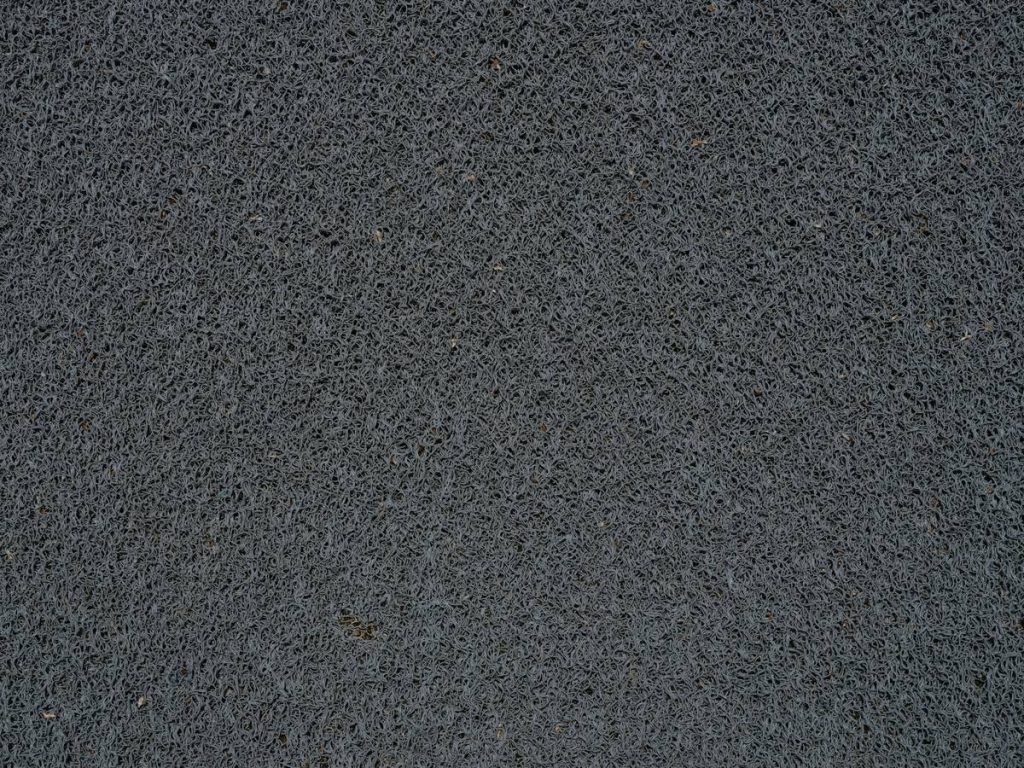 close up of synthetic gray doormat texture
