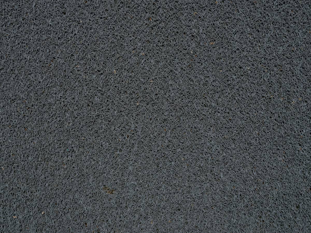close up of synthetic gray doormat texture