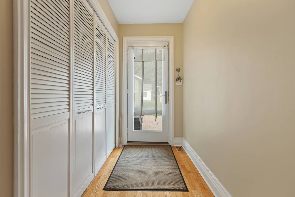 Layered doormats for inside entrance home showing scraper and absorbent combo